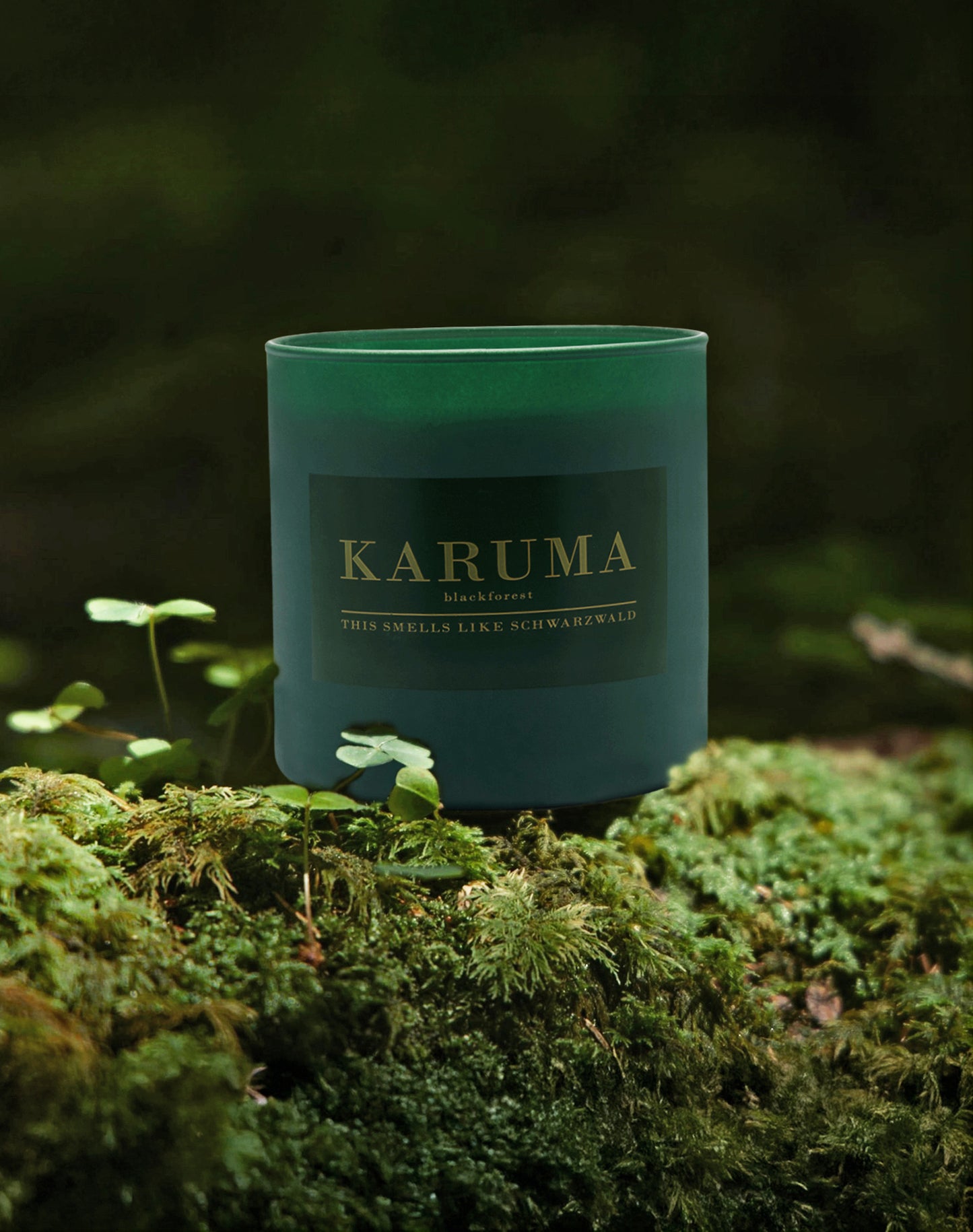 Luxury vegan scented candle with three wicks in elegant packaging, labelled „This Smells Like Schwarzwald" - Black Forest Dawn Candle by Karuma