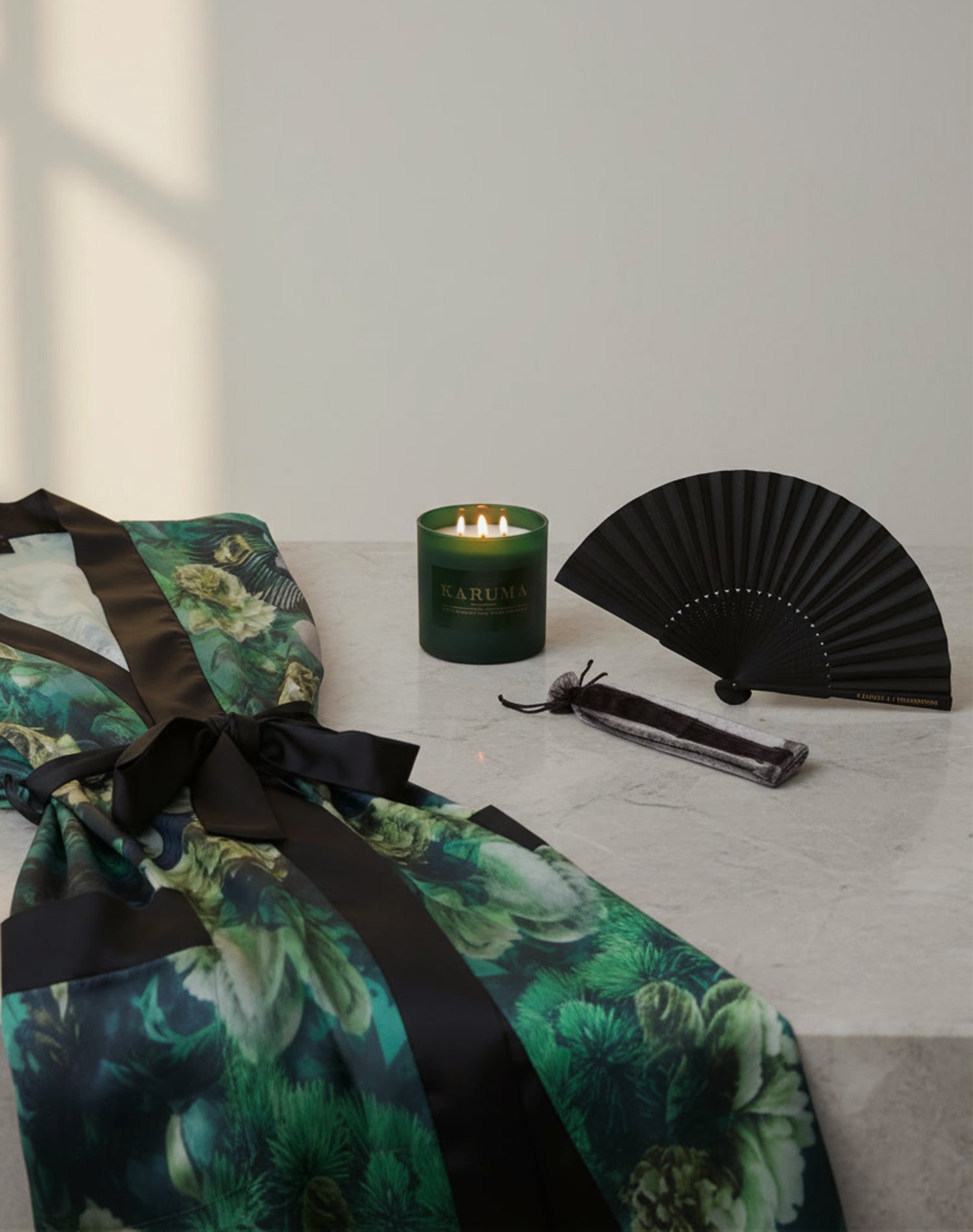 Luxury kimono gift set by Karuma including the Jade Wilderness Kimono, Black Forest Dawn Scented Candle and Karuma Signature Fan-limited edition designer gift for her