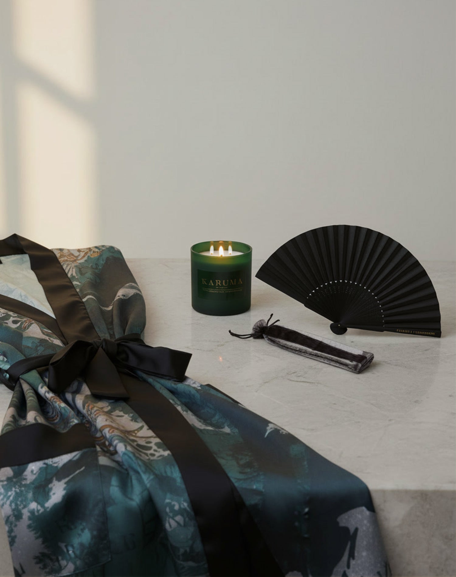 Luxury kimono gift set by Karuma including the Atlas of Steel Kimono, Black Forest Dawn Scented Candle and Karuma Signature Fan the perfect gift for her, available in Midnight Black or Forest Green