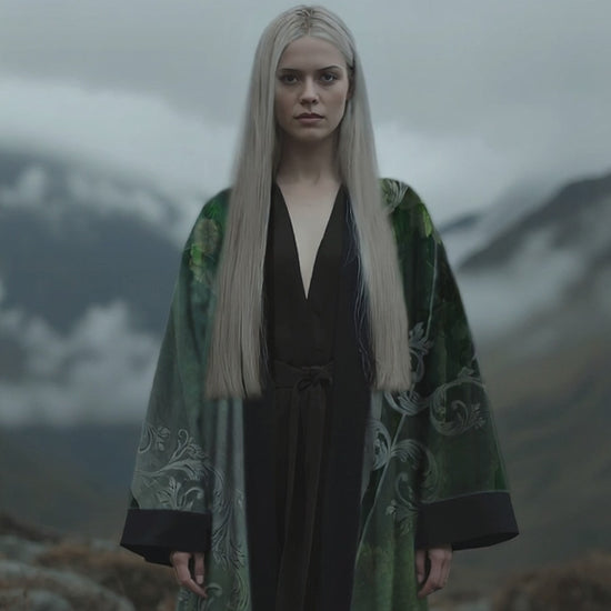 A nordic womam wearing the Emerald Portal Kimono from the Karuma blackforest fashion label from Germany