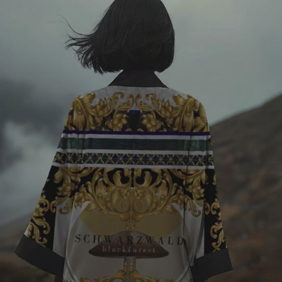 Black meets gold in a battle of elegance. This warrior-spirit kimono is pure drama - designed for women who were born to conquer