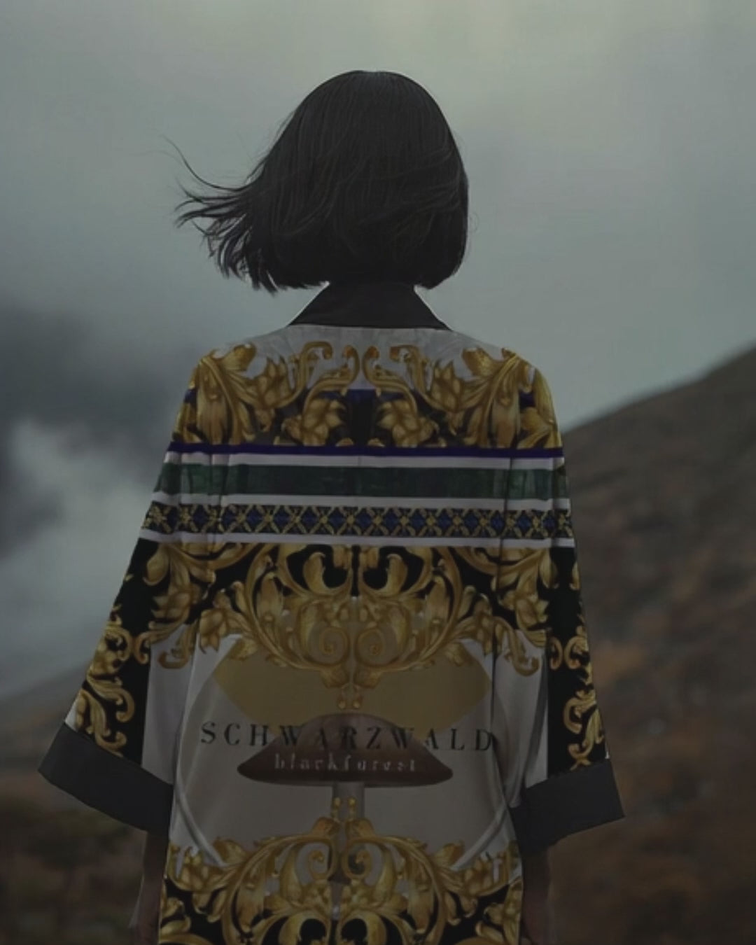 Black meets gold in a battle of elegance. This warrior-spirit kimono is pure drama - designed for women who were born to conquer