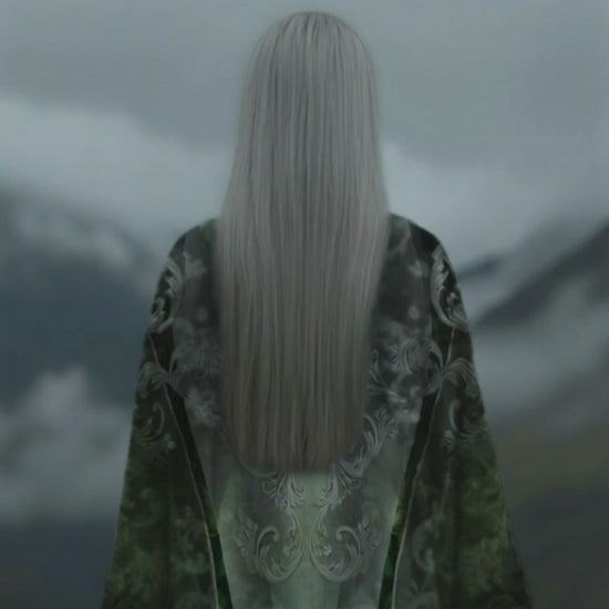 A nordic womam wearing the Emerald Portal Kimono from the Karuma blackforest fashion brand